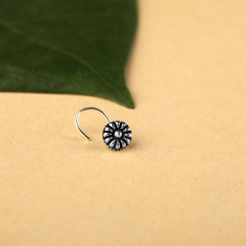 925 Oxidised Flower Nose Pin displayed on festive prop – Raksha Bandhan and Bhai Dooj jewellery gift