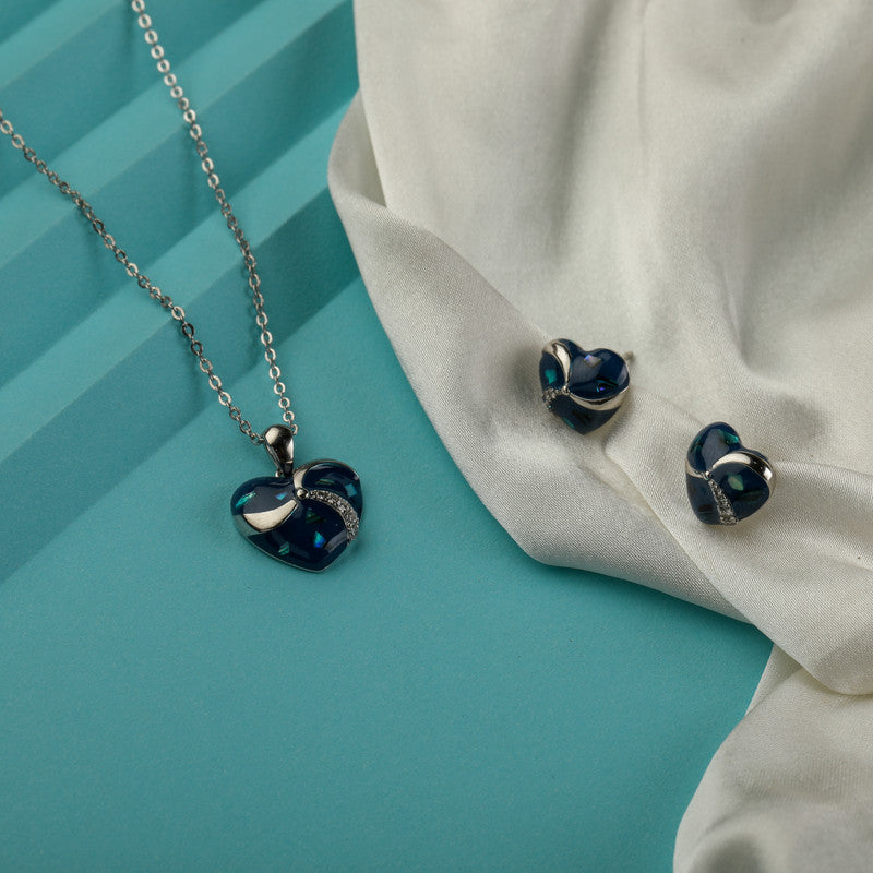 925 silver blue heart pendant and earrings displayed with props – romantic silver accessory set
