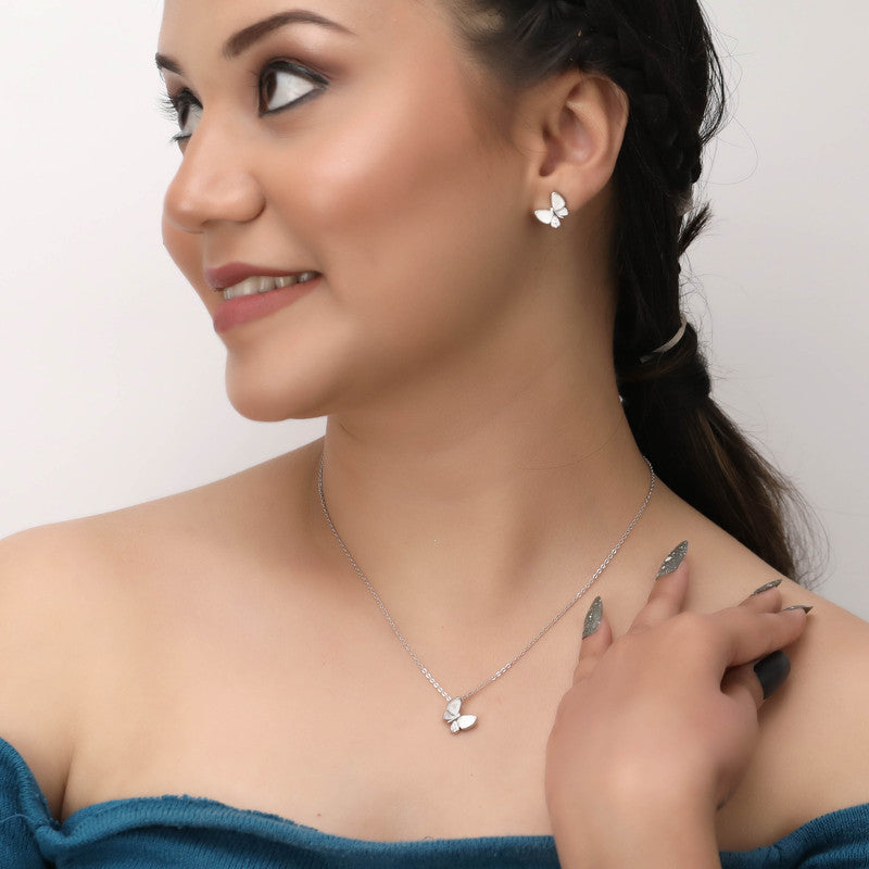 Woman wearing 925 silver butterfly pendant and earrings – stylish ethnic jewelry set