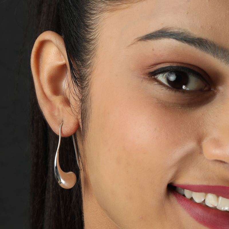 Model wearing 925 Silver Cashew Nut Earrings – graceful and lightweight sterling silver jewellery for women.