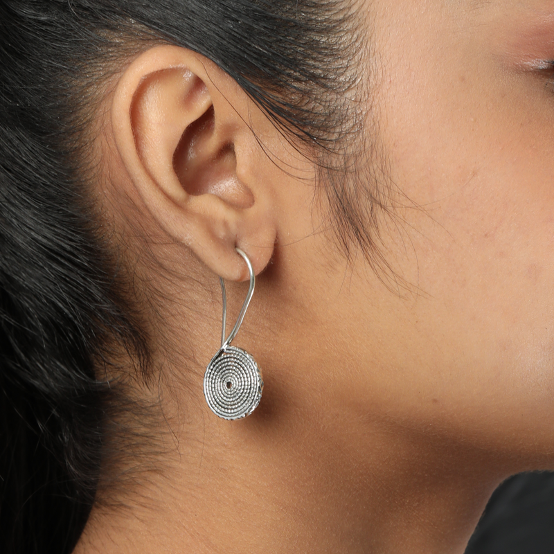 Model wearing 925 Silver Coiled Charm Earrings – graceful and lightweight sterling silver jewellery for women.