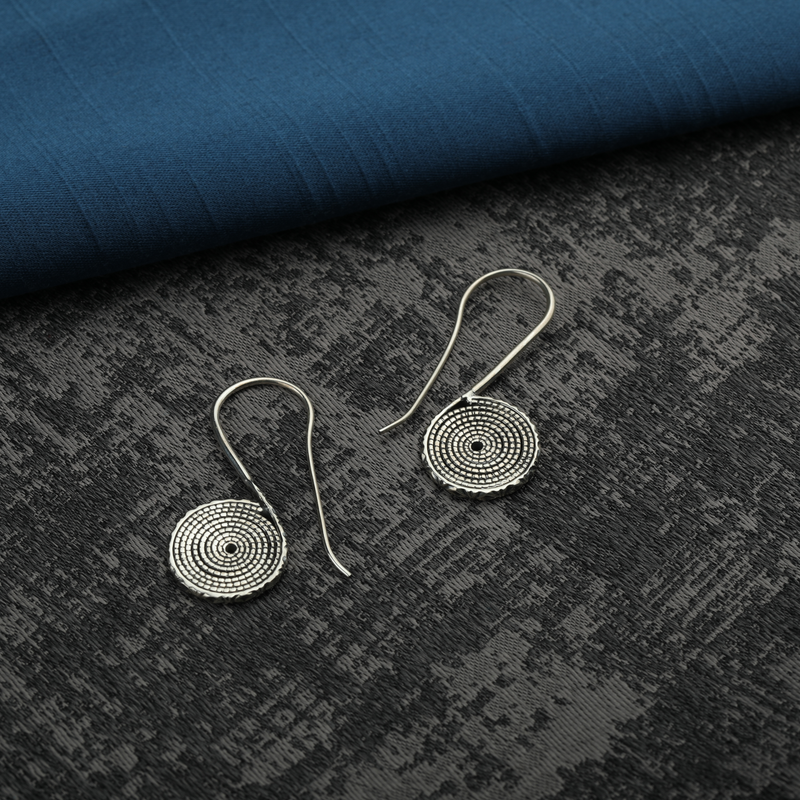 925 Silver Coiled Charm Earrings displayed as prop image on festive background – stylish silver earrings with fine detailing.