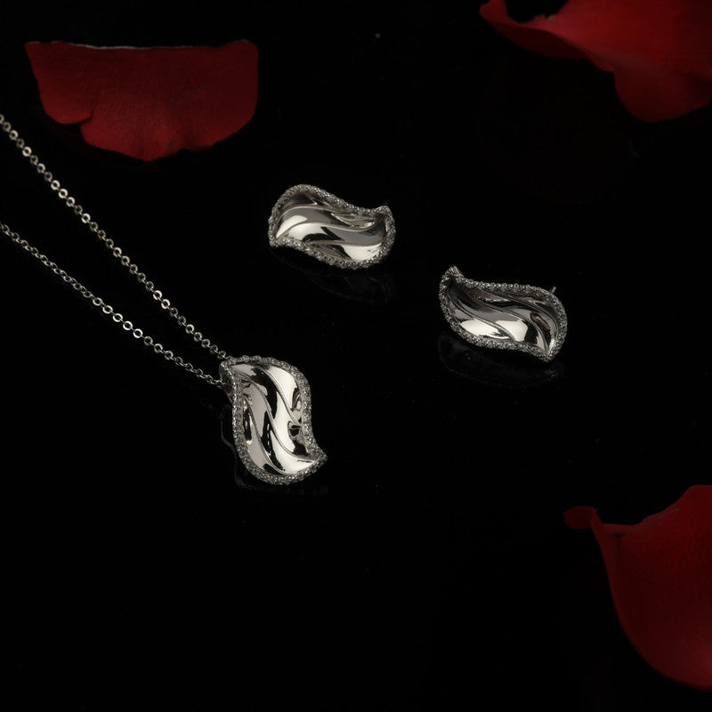 925 silver designer pendant set displayed with props – unique silver accessory