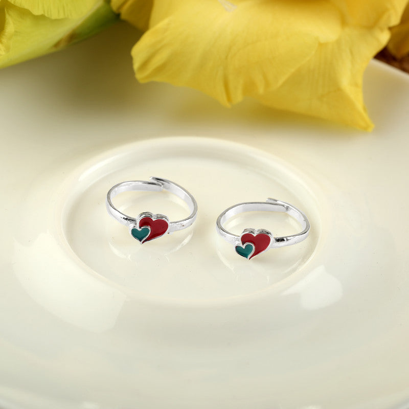 925 silver double heart toe ring displayed with props – romantic silver accessory