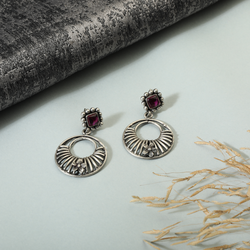 925 Silver Filigree Earrings – Bella Donna displayed as prop image on festive background – elegant silver earrings with fine detailing.