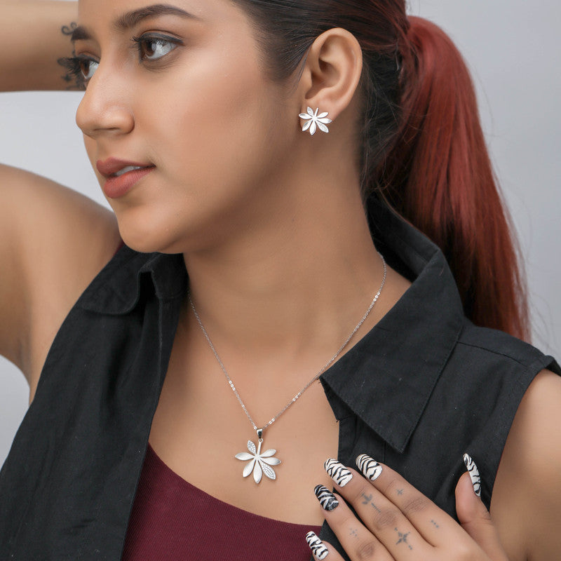 Woman wearing 925 silver floral pendant and earrings – stylish ethnic jewelry set
