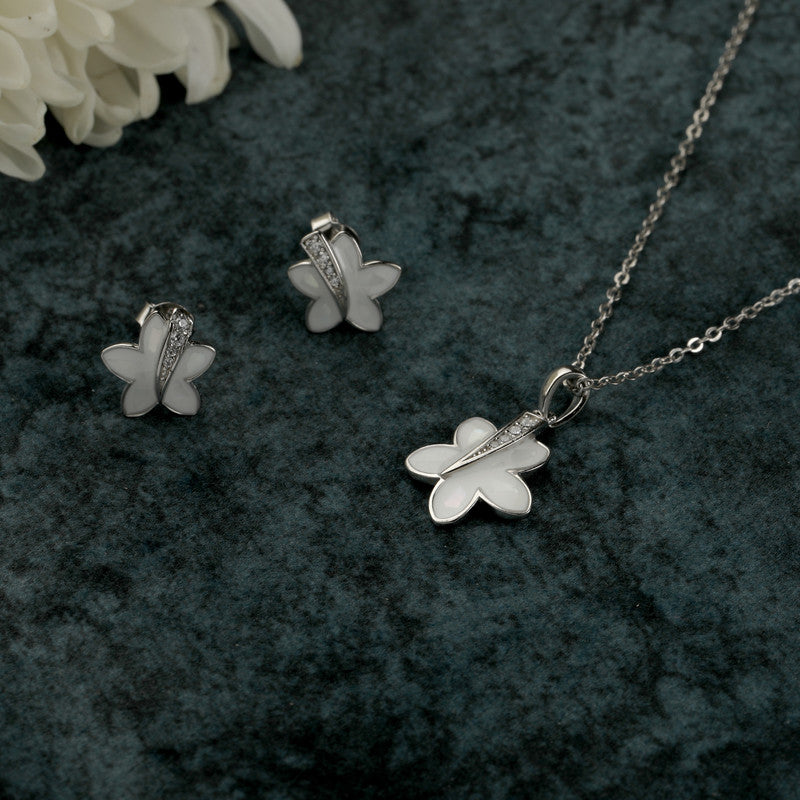 925 silver floret pendant and earrings displayed with props – floral silver accessory set