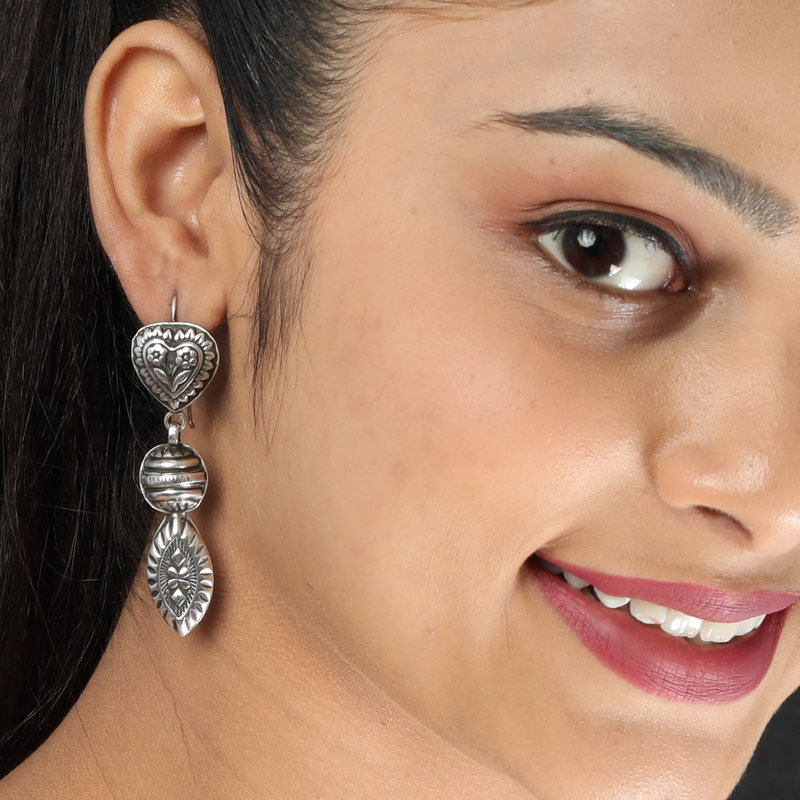 Model wearing 925 Silver Heart & Leaf Earrings – lightweight, stylish, and elegant sterling silver jewellery for women