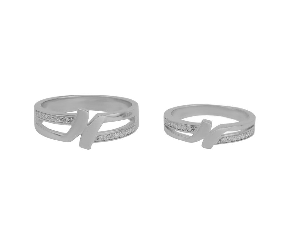 925 silver initial couple rings photographed on plain white background