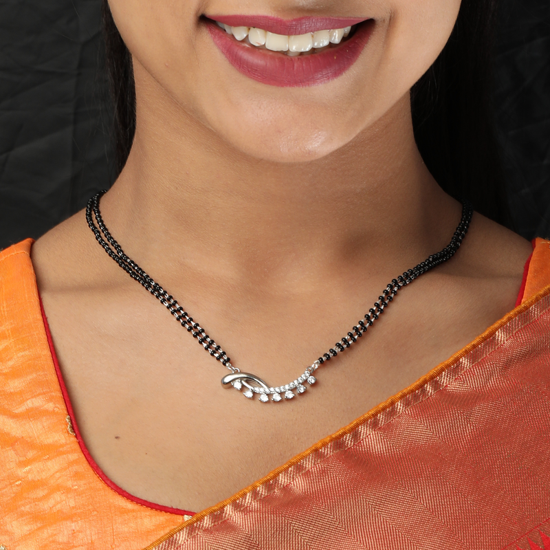 Model wearing 925 Silver Knot of Devotion Mangalsutra – elegant and lightweight pendant necklace for women.