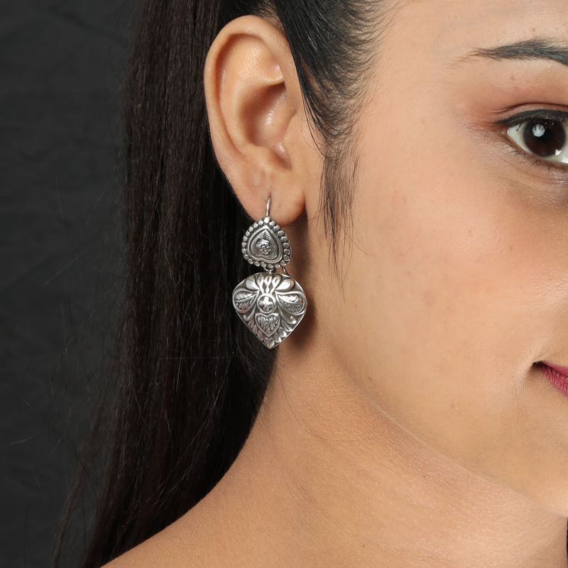 Model wearing 925 Silver Love Earrings – elegant, lightweight, and unique sterling silver jewellery for women.