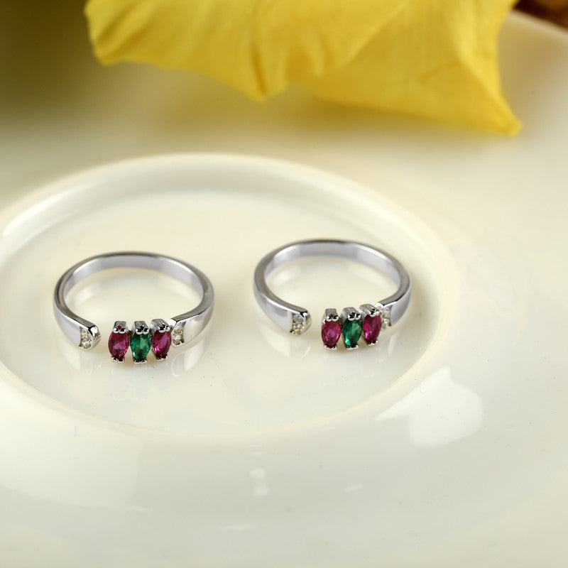 925 silver multi-gemstone toe ring displayed with props – colorful silver accessory
