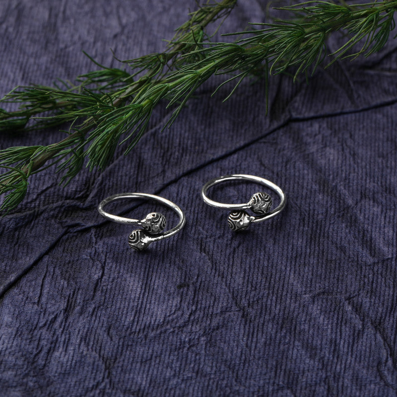 925 silver open ball toe ring displayed with props – minimalist silver accessory