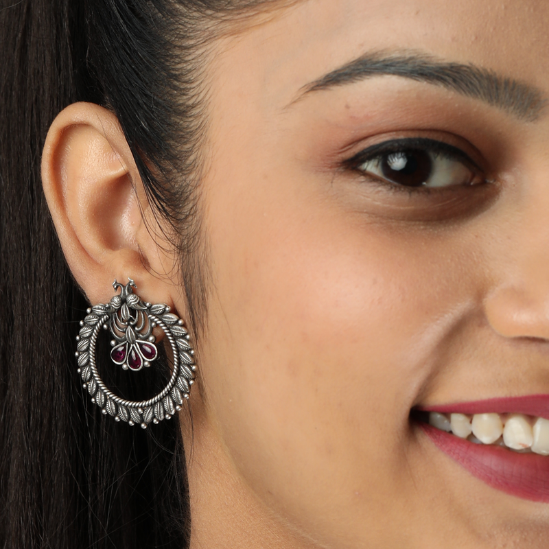 Woman wearing 925 Silver Peacock Earrings – stylish and graceful look