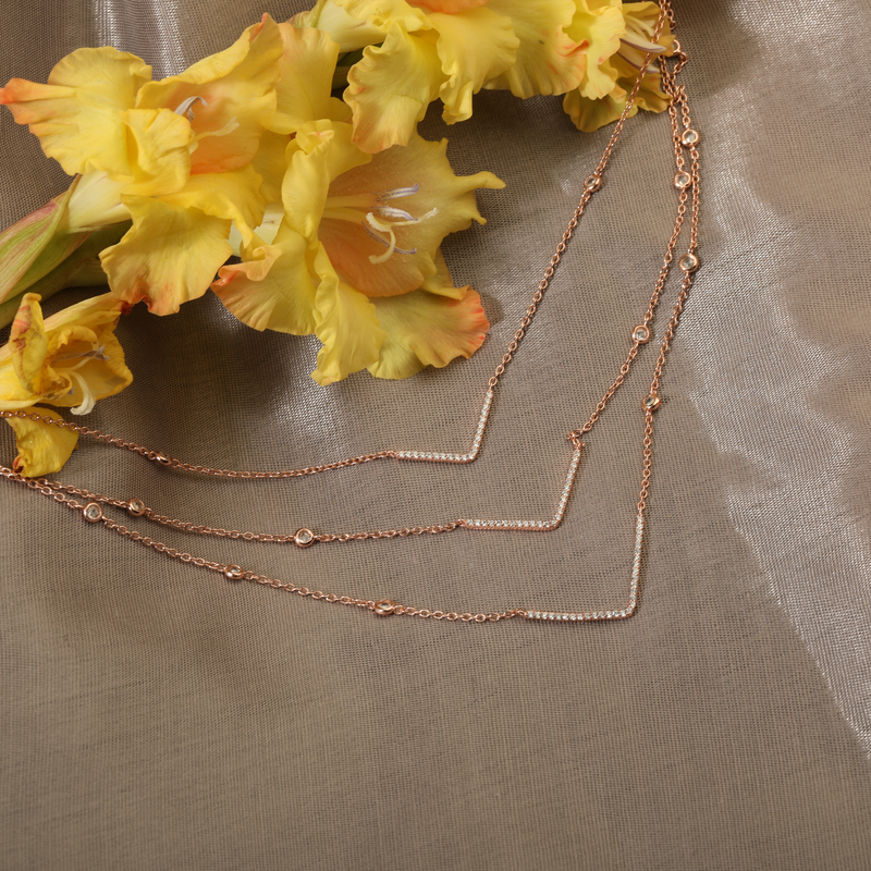 925 Silver Rose Gold Charm Necklace displayed as prop image on festive background – stylish silver necklace with fine detailing.