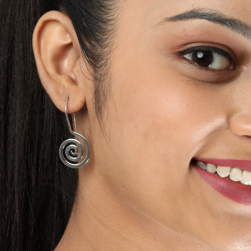 Model wearing 925 Silver Spiral Earrings – graceful and lightweight sterling silver jewellery for women.
