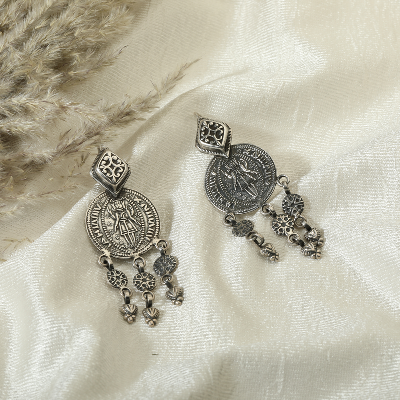 925 Silver Tassel Earrings displayed as prop image on festive background – trendy silver earrings with fine detailing.