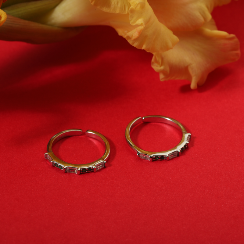 925 Silver Tiny Trinket Toe Ring displayed on festive background – stylish sterling silver toe ring with fine detailing.