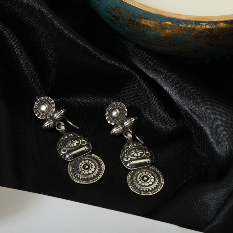 925 Silver Tribal Earrings displayed as prop image on festive background – traditional silver earrings with fine detailing.