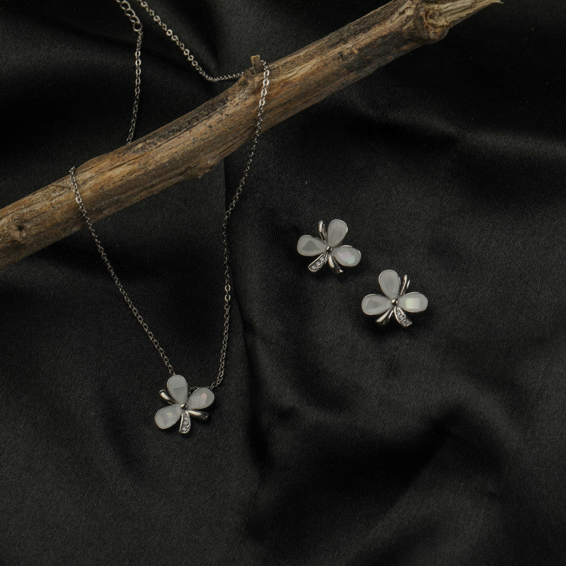 925 silver white flower pendant set displayed with props – floral silver accessory
