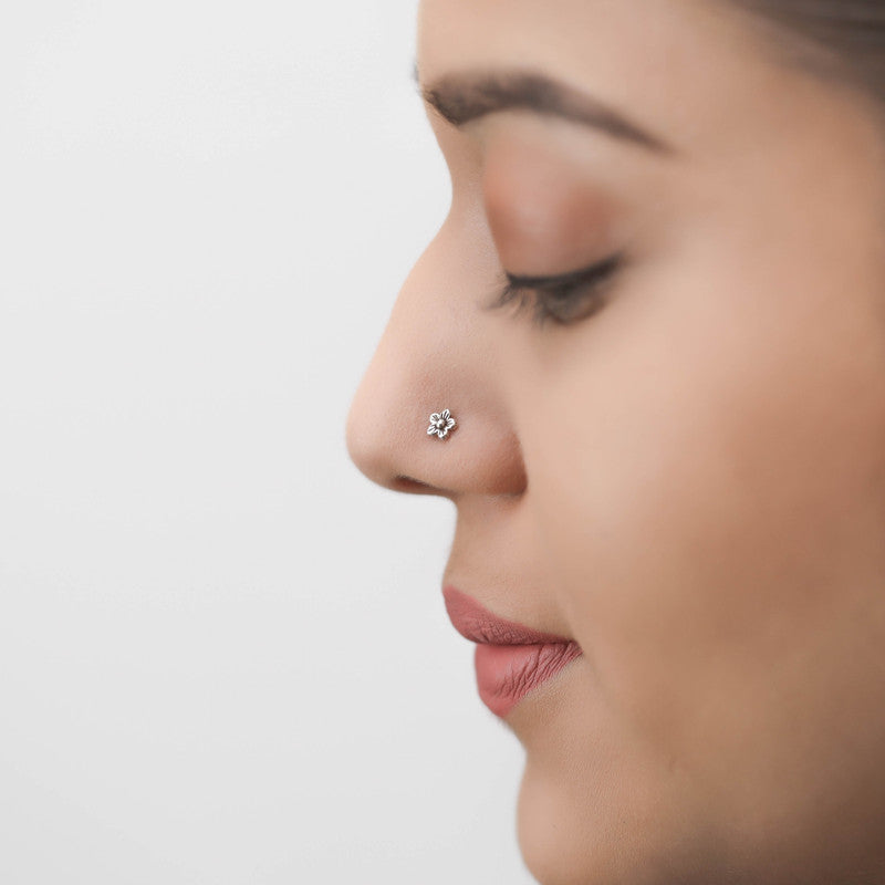 Woman wearing 925 Sterling Silver Floral Nose Pin styled on nose