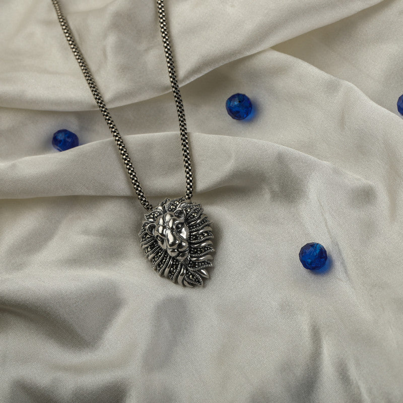 Men’s 925 Sterling Silver Lion Head Pendant with Detailed Lion Face displayed on surface