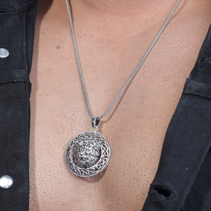 Men’s 925 Sterling Silver Lion Ring Pendant with Detailed Lion Head Design displayed on surface