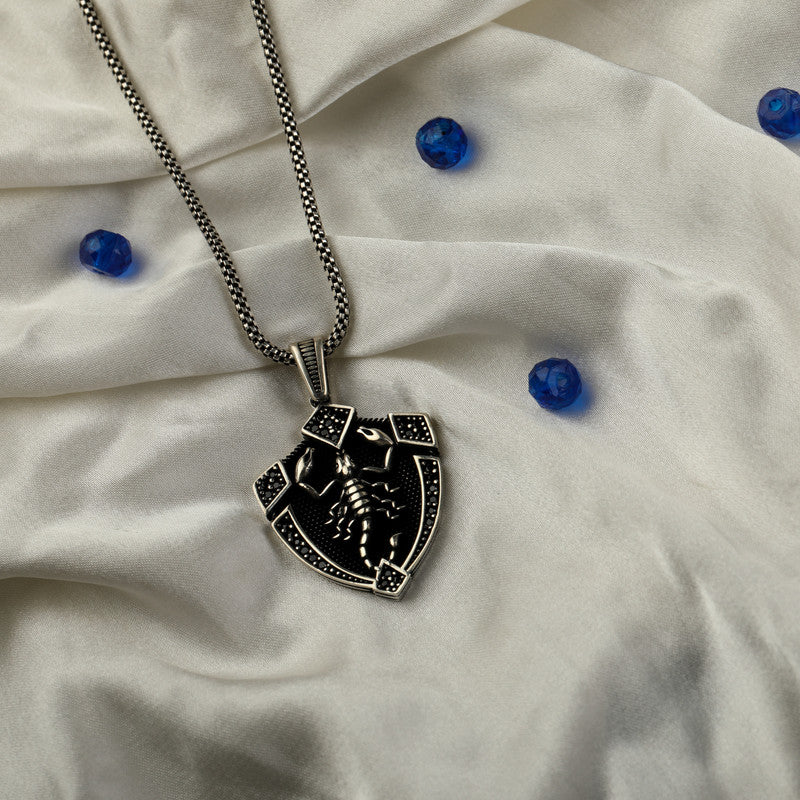 Men’s 925 Sterling Silver Scorpio Pendant with Detailed Zodiac Symbol displayed on surface