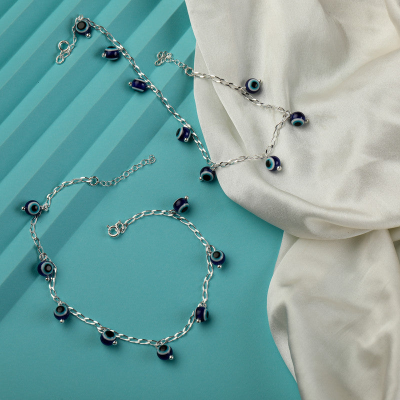 Shining 925 silver anklet with evil eye charm, radiant jewellery for Karwa Chauth and Diwali wear.