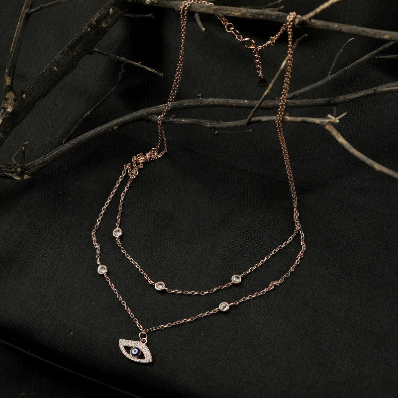 Shimmering 925 silver evil eye layered necklace in rose gold, glowing beautifully for Diwali nights and parties.
