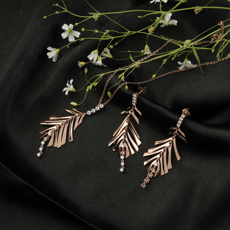 Shimmering 925 silver feather rose gold set, glowing beautifully for Diwali nights and weddings.