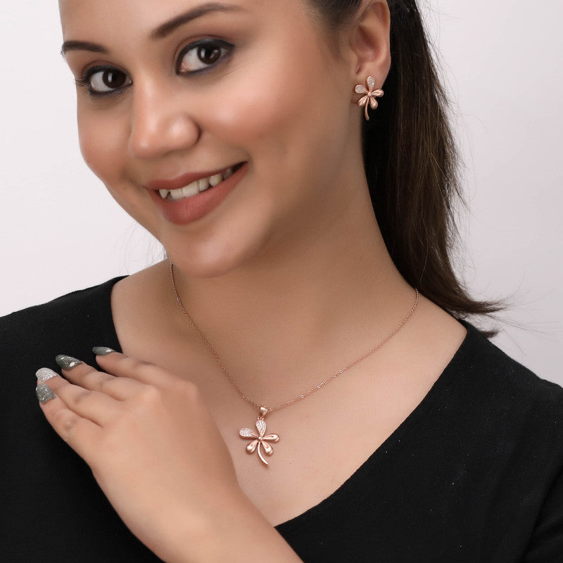 Woman wearing silver five leaf pendant set, elegant jewellery for festivals and parties.