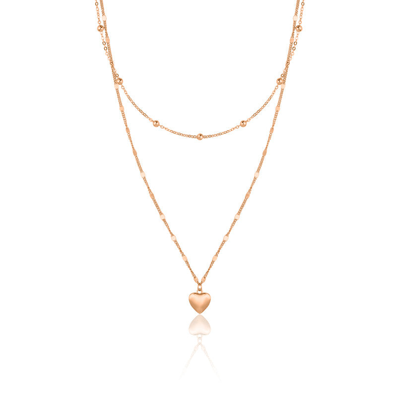 Delicate layered heart silver necklace, a timeless festive jewellery gift for her.