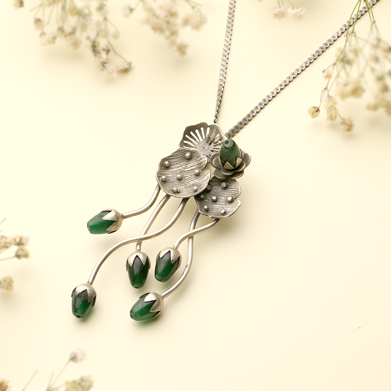 Elegant antique silver lotus pendant necklace ideal for traditional outfits and cultural celebrations