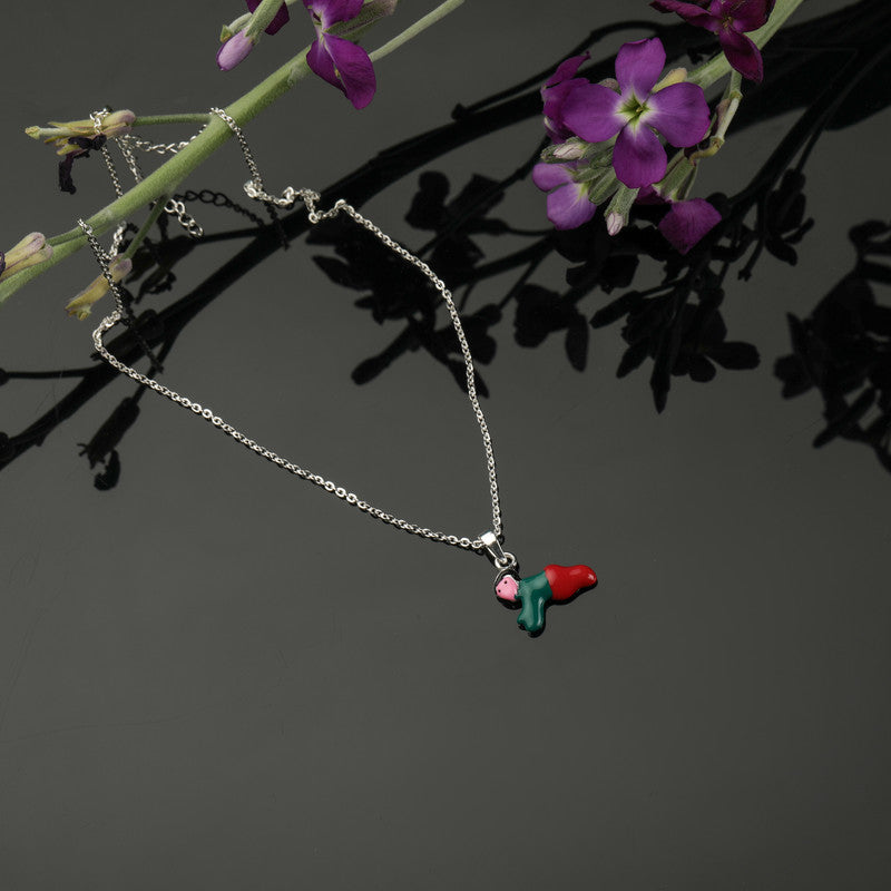 Baby Angel Kids Pendant in 925 Silver with Red Heart Charm styled on plant