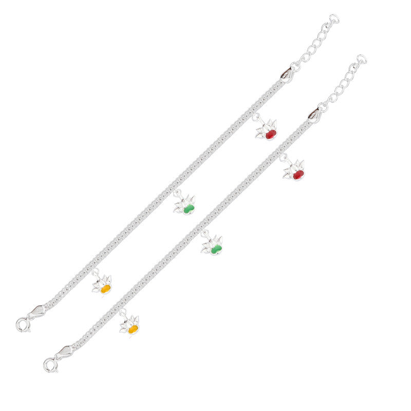 Baby girl silver anklet displayed with props – delicate silver accessory