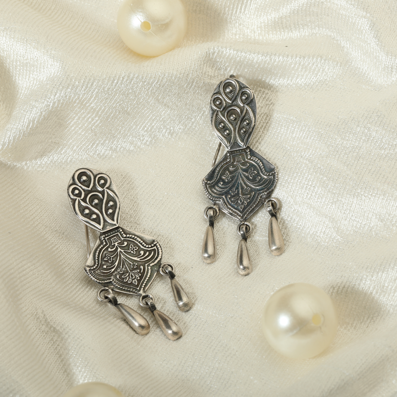 Bohemian 925 Silver Tribal Earrings displayed as prop image on festive background – traditional silver earrings with fine detailing.