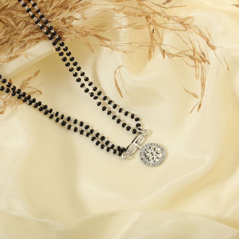925 Silver Eternal Essence Mangalsutra displayed on festive background – traditional silver jewellery with graceful design.