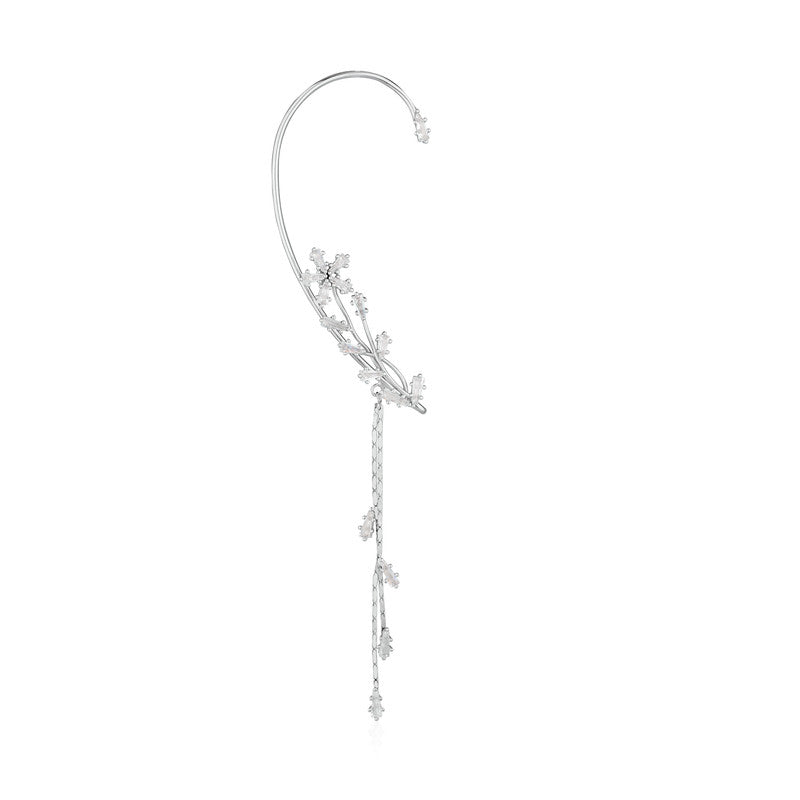 Floral ear cuff with tassel for women – elegant festive jewellery for Diwali, Navratri, and wedding celebrations.