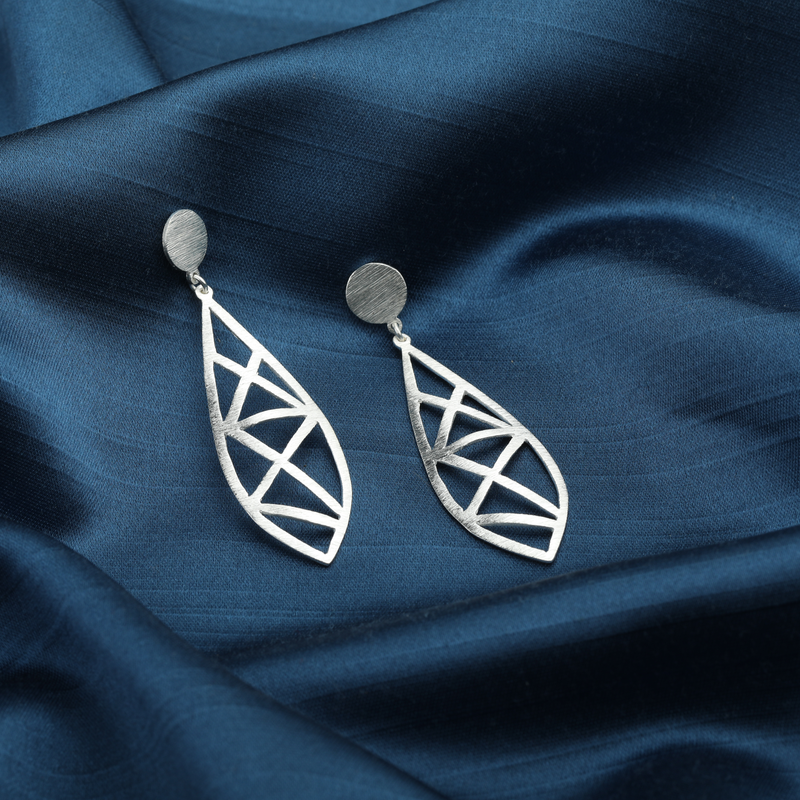 925 Silver Geometric Earrings displayed as prop image on festive background – stylish silver earrings with fine detailing.