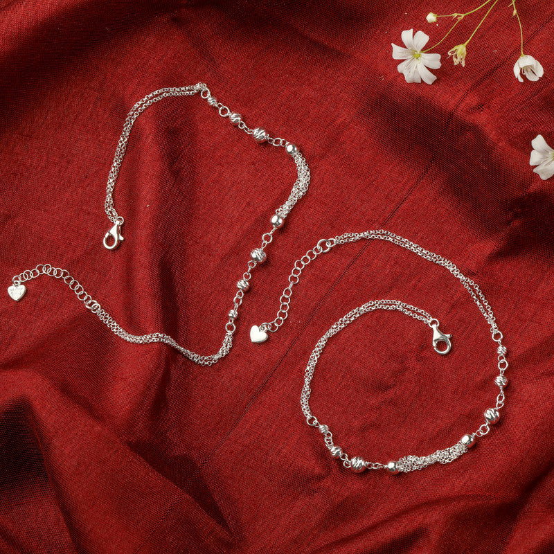 Sparkling 925 silver anklet with mirror ball charms, radiant accessory for Karwa Chauth and Diwali wear.