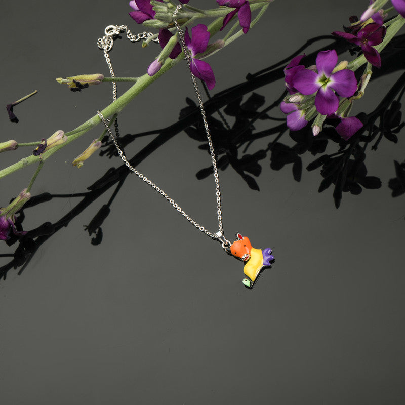 Lucky Cow Pendant Necklace for Kids in 925 Silver styled on playful background