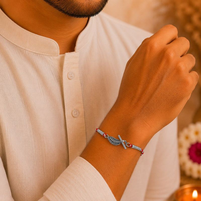 Silver Bansuri Rakhi for Brother with Roli Chawal