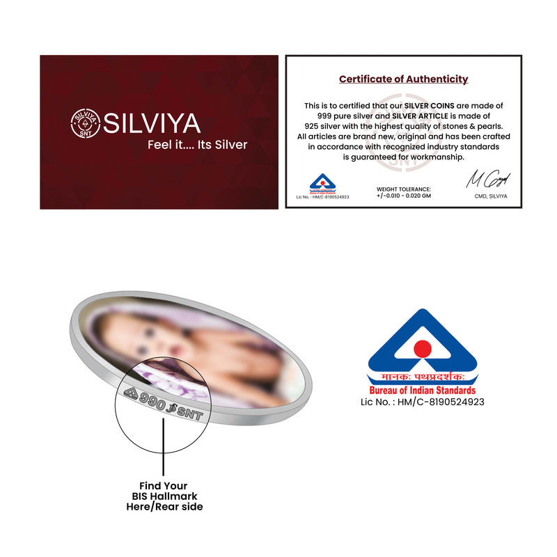 Authenticity certificate for round 999 pure silver baby boy keepsake coin.