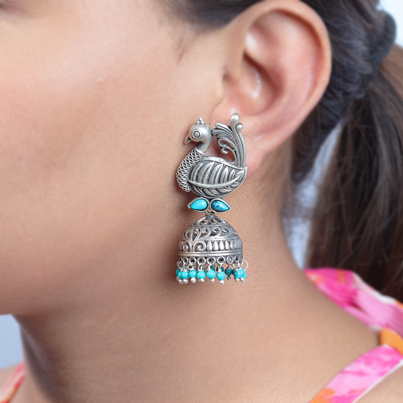 Oxidized 925 Silver Peacock Jhumka on Model – Elegant Silver Jewellery for Navratri, Diwali and Wedding Outfit Styling