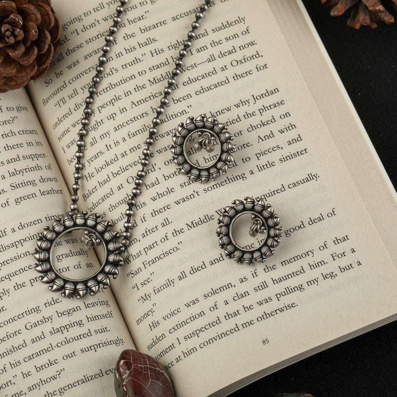 Oxidized Silver Hollow Circle Pendant displayed on festive prop – Raksha Bandhan and Bhai Dooj gift idea
