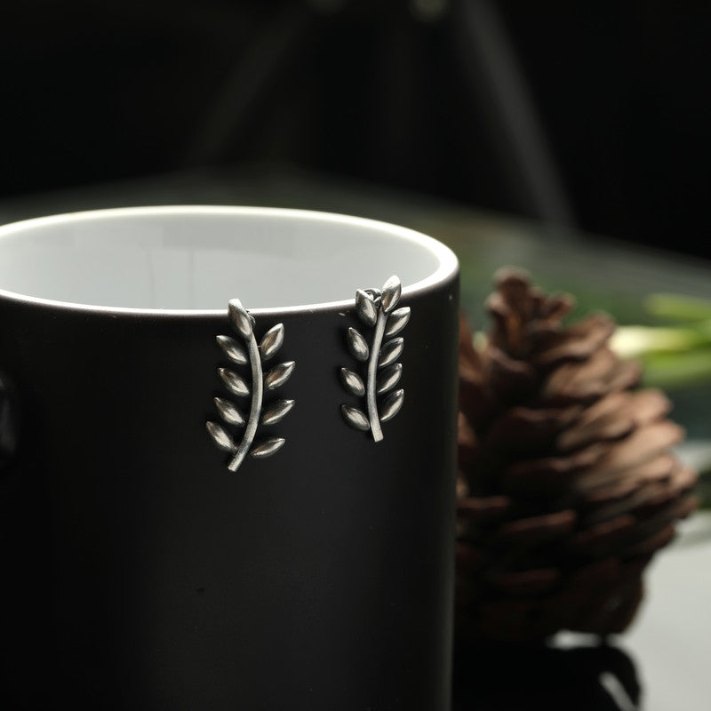 Designer Oxidized Silver Olive Branch Earrings with Ethnic Backdrop – Traditional Silver Jewellery for Festive Celebrations
