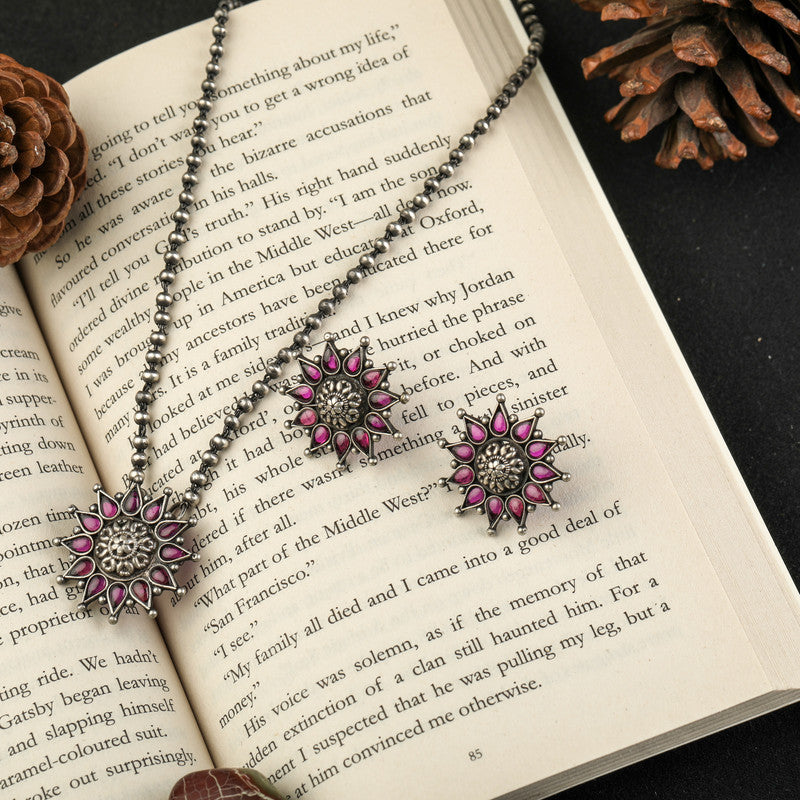 Oxidized Silver Pink Floral Pendant displayed on festive prop – Raksha Bandhan and Bhai Dooj gift idea