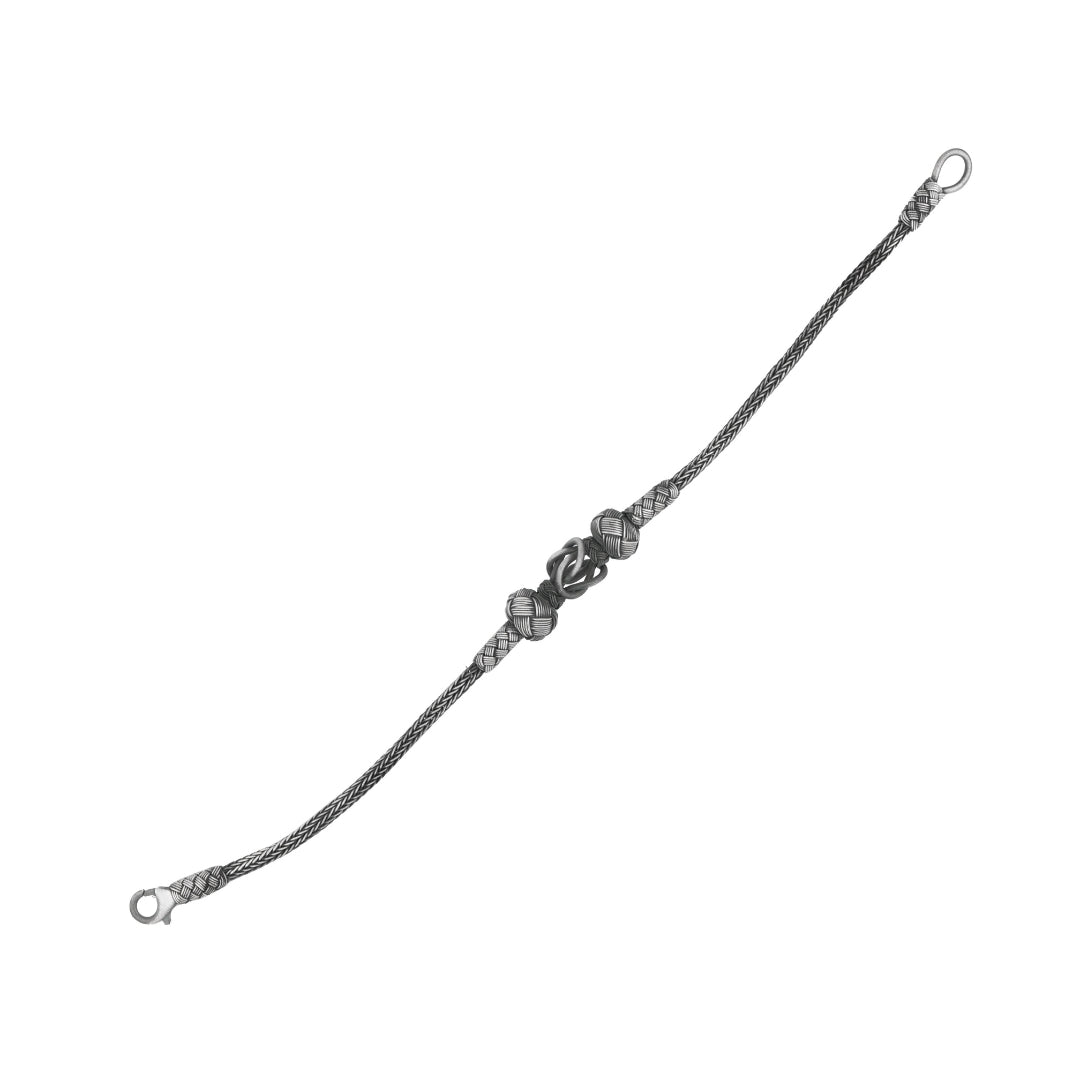 Oxidized Silver Reef Knot Bracelet on white background – classic oxidized jewelry for Navratri, Diwali, Raksha Bandhan and festive wear