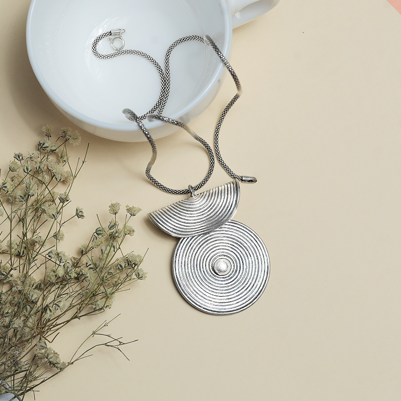 Designer Oxidized Silver Spiral Pendant with Floral Background – Traditional Silver Jewellery for Festive Celebrations